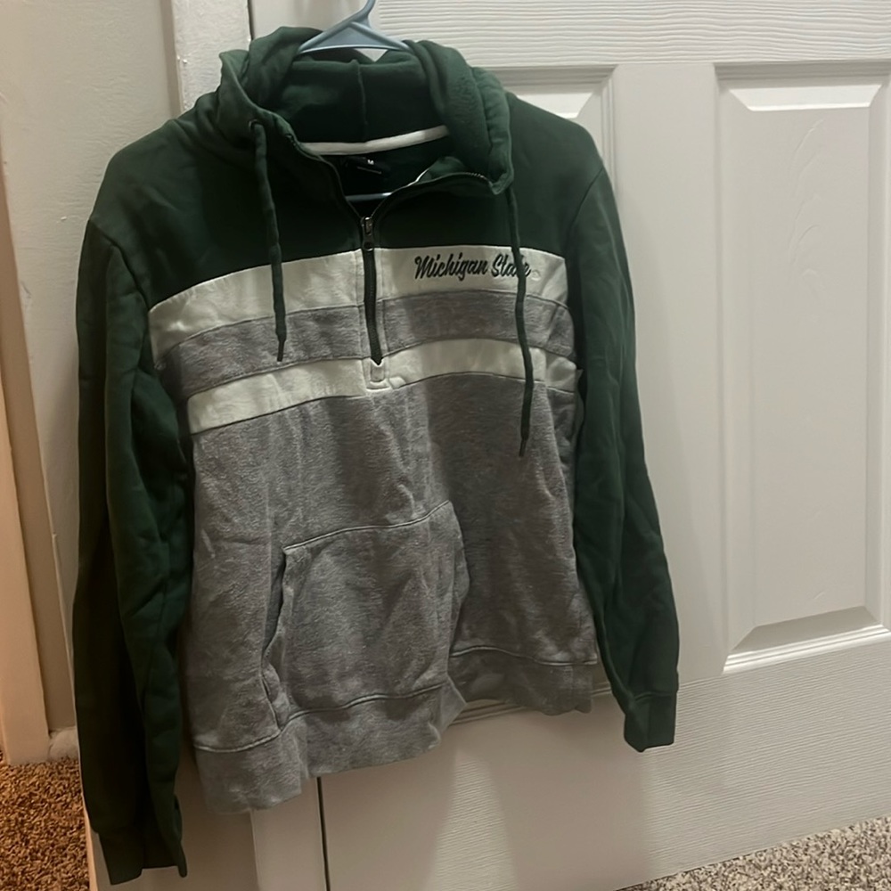 Michigan State sweatshirt size Medium.